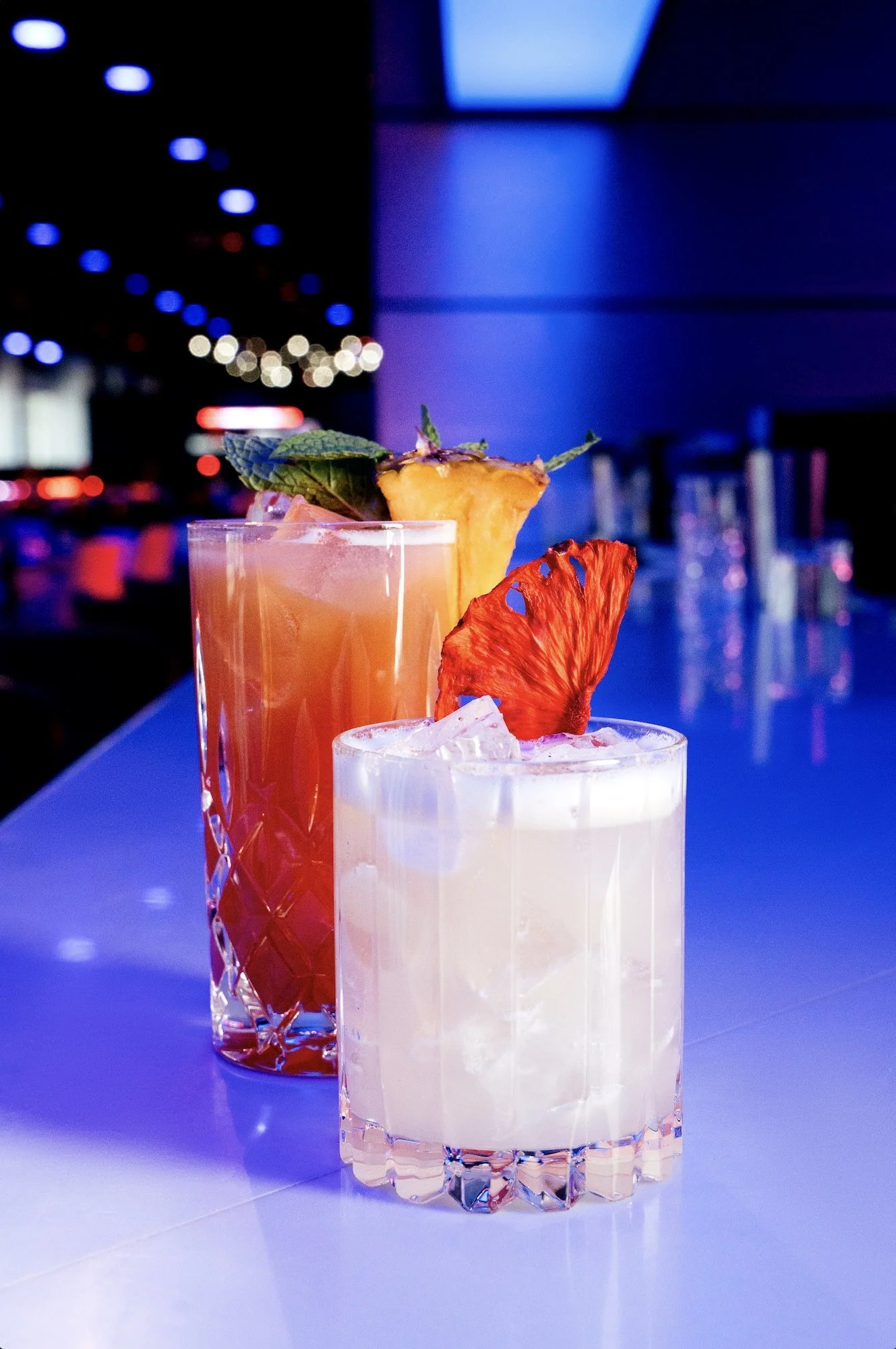 The Overtake Oasis (foreground) and Tropical Throttle cocktails at Formula 1's Las Vegas Cocktail Lounge