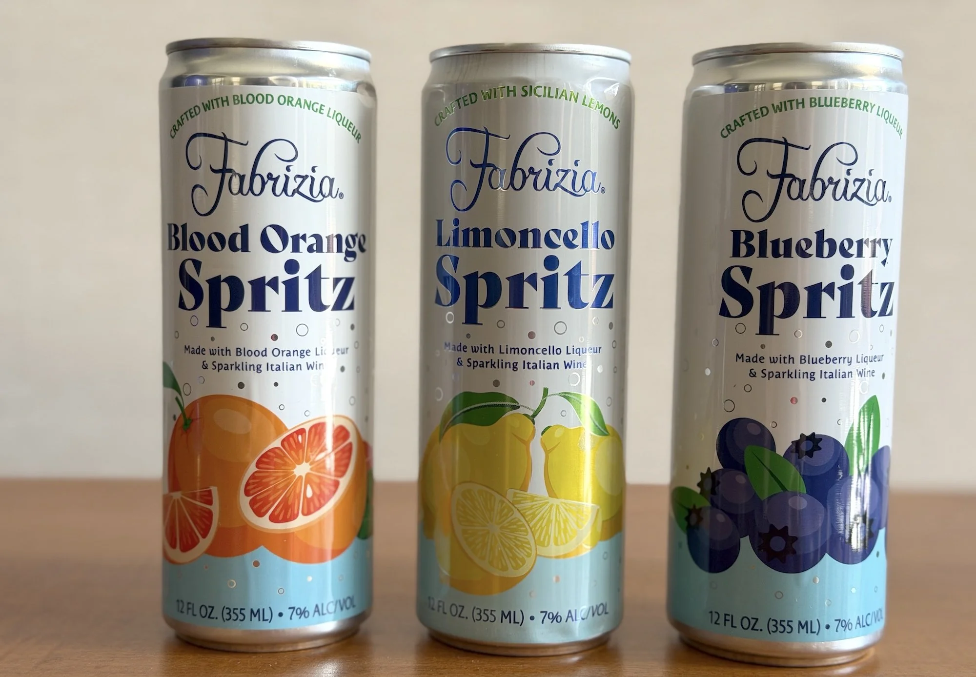 Fabrizia spritzes in blood orange, limoncello, and blueberry