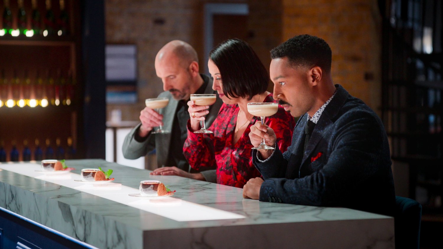 Drink Masters judges sampling a cocktail