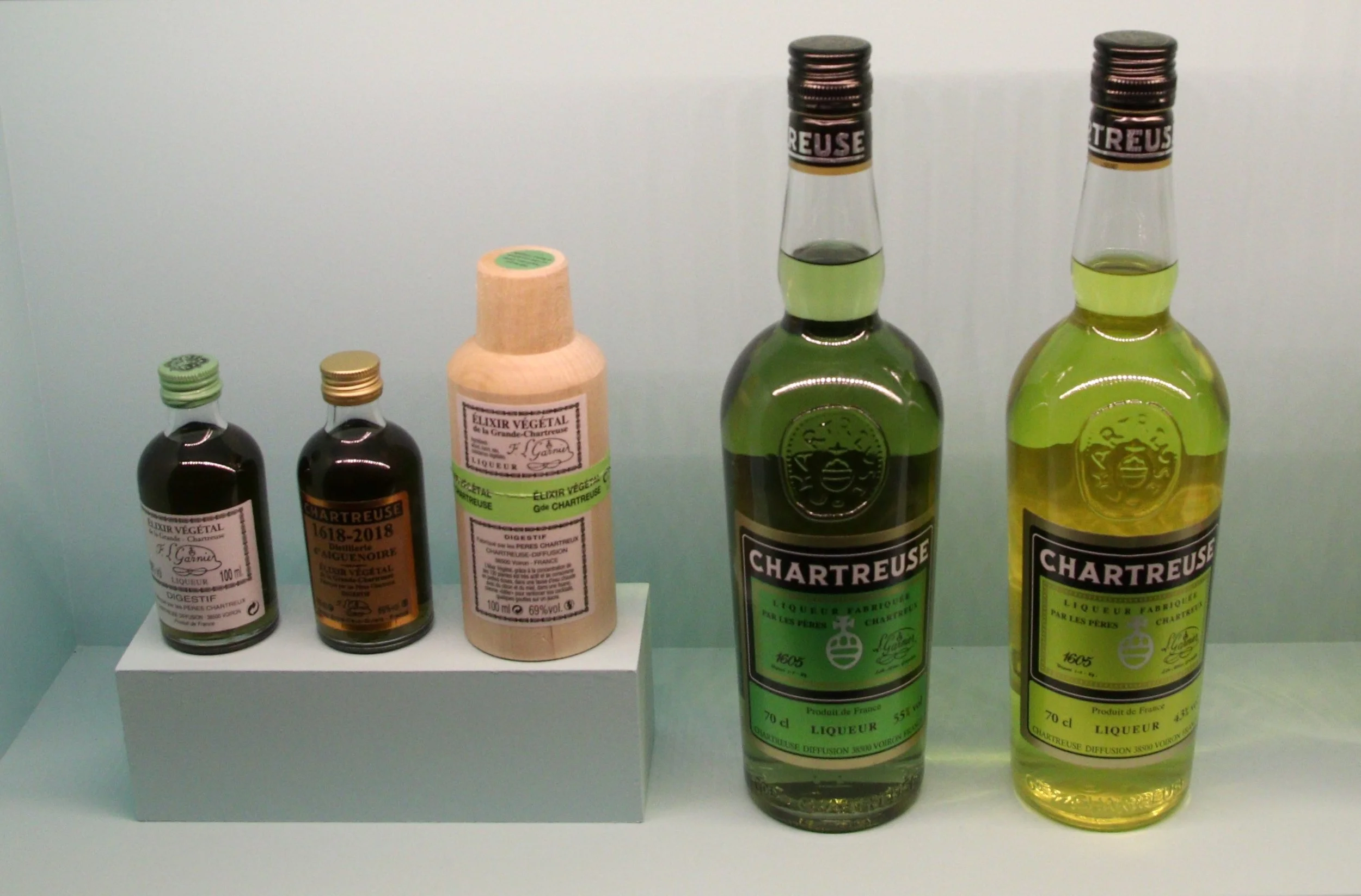 Bottles of Chartreuse Elixir Végétal, Green Chartreuse, and Yellow Chartreuse
