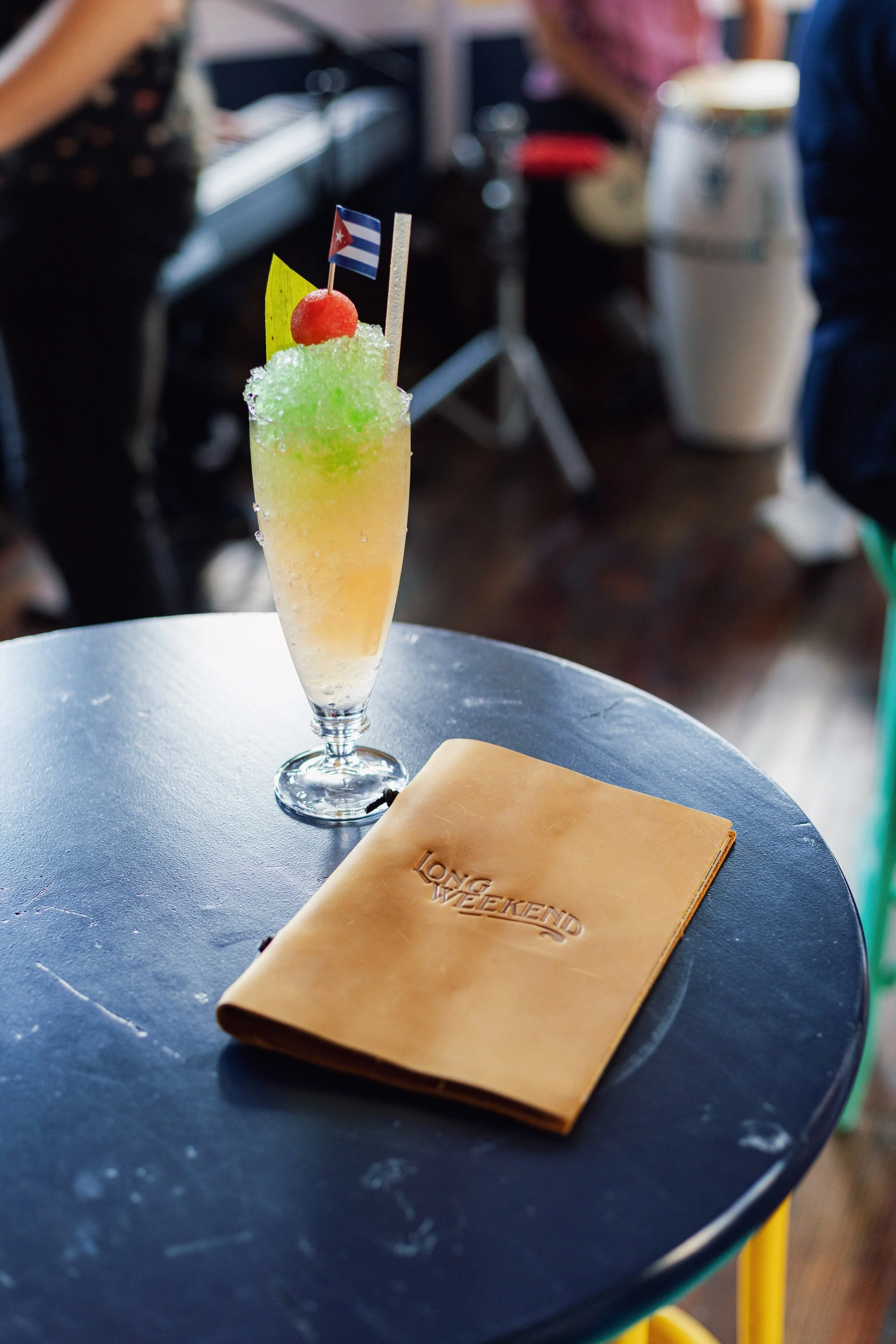 A Watermelon Daiquiri Granizado topped with a Midori float at Long Weekend