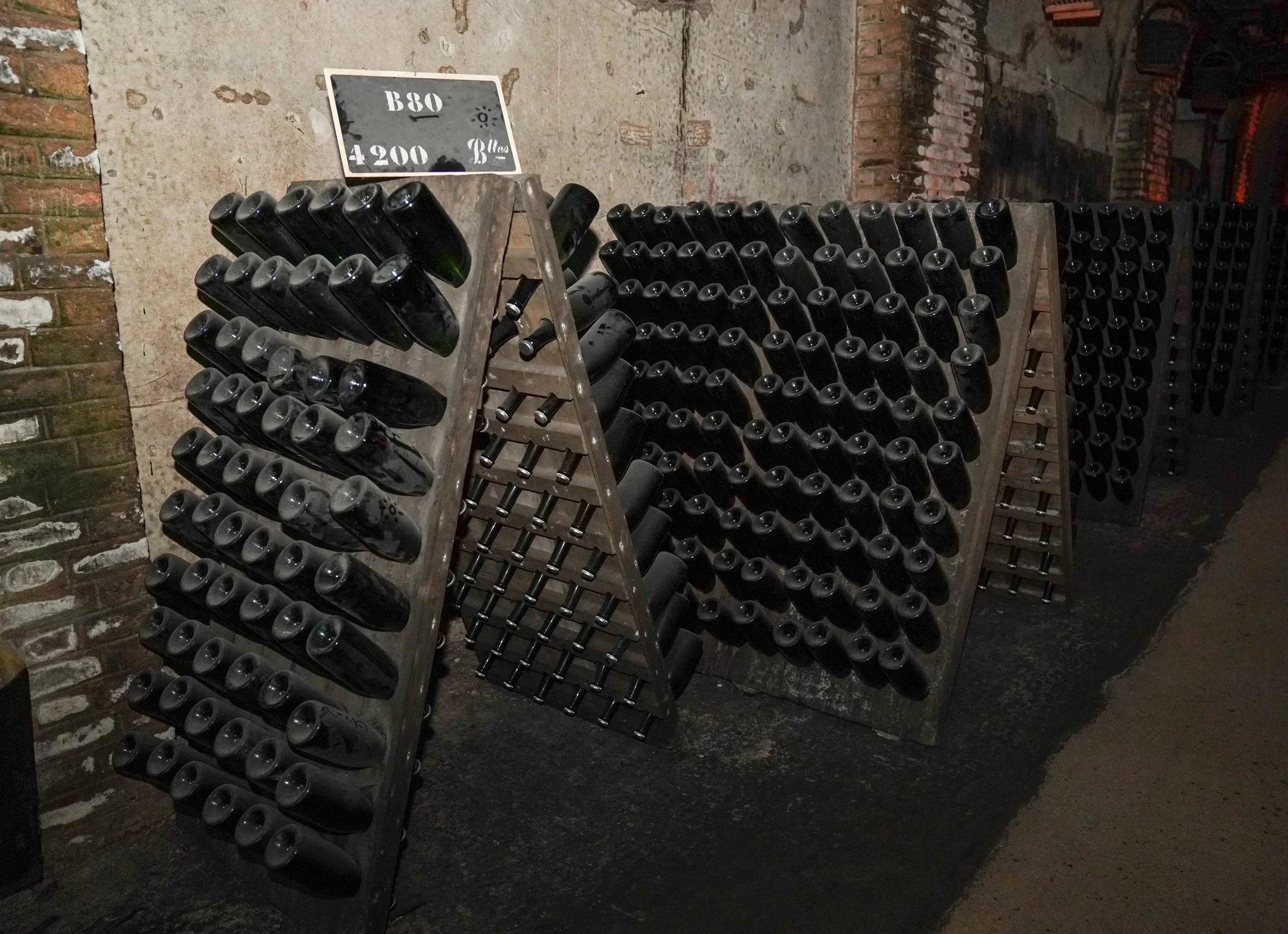 Bottles on riddling racks