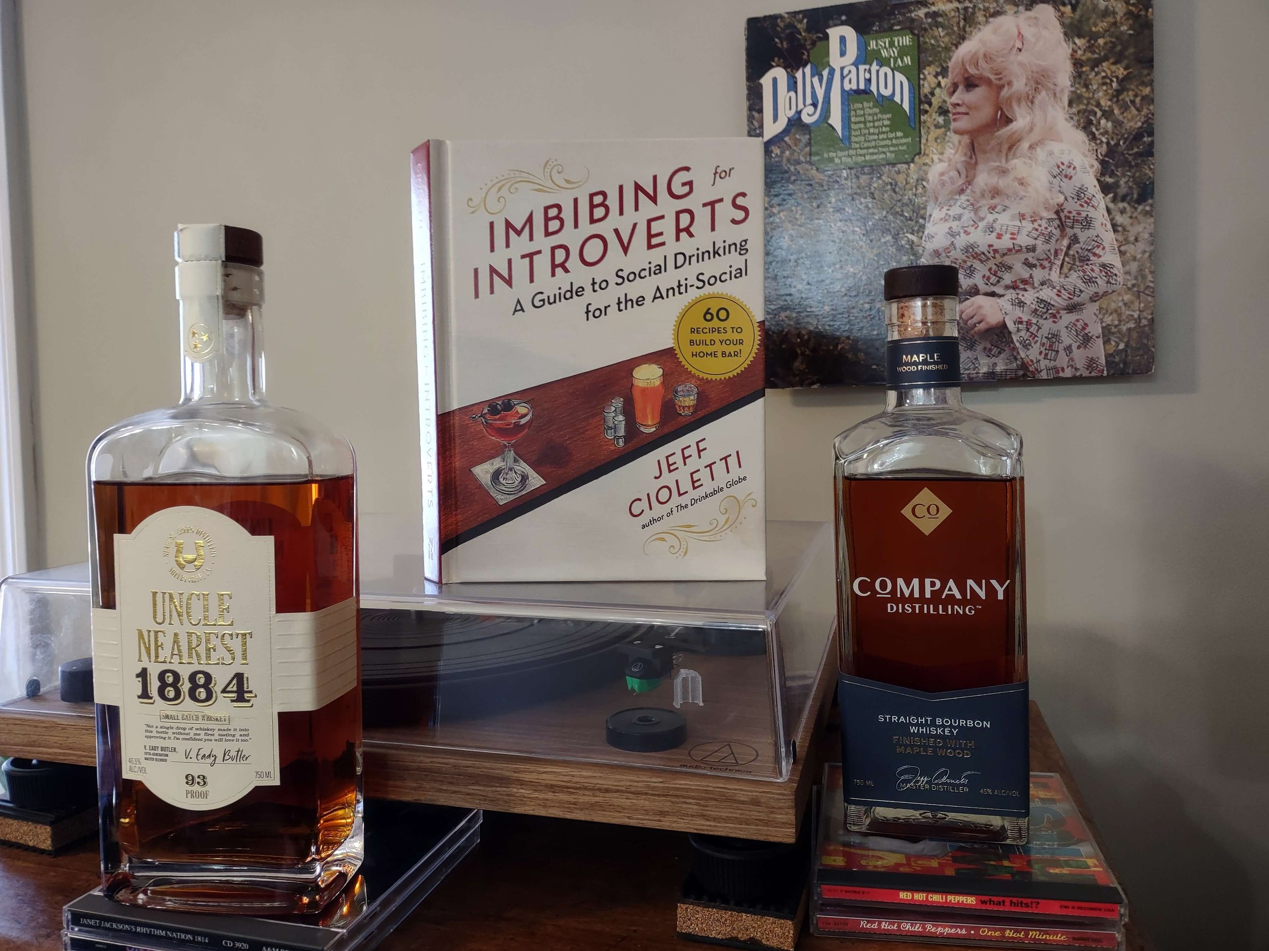 Imbibing for Introverts book with whiskies