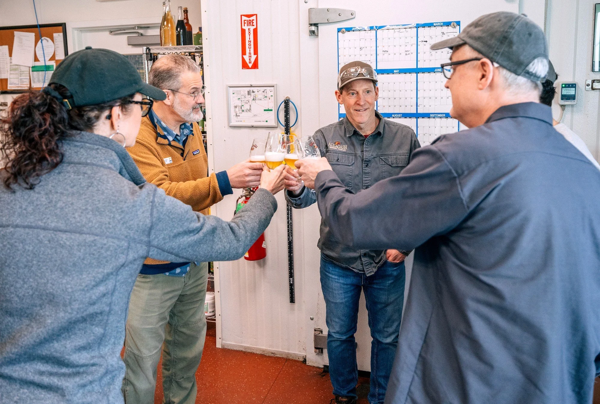 Allagash’s Rob Tod and Jason Perkins with Russian River Brewing’s Natalie and Vinnie Cilurzo (in foreground) tasting a pilot batch of BRU Pils