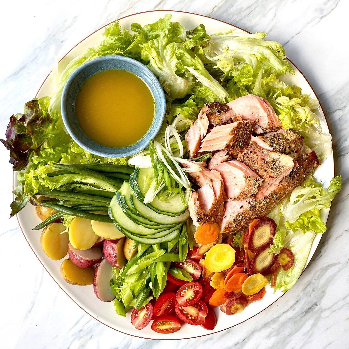 Smoked Salmon Ni&ccedil;oise-ish Salad, but make it family style!  Hubs has been getting well-acquainted with an old smoker during this time at home and getting pretty good at it!  We&rsquo;ve been learning the beauty and patience of smoking meats an