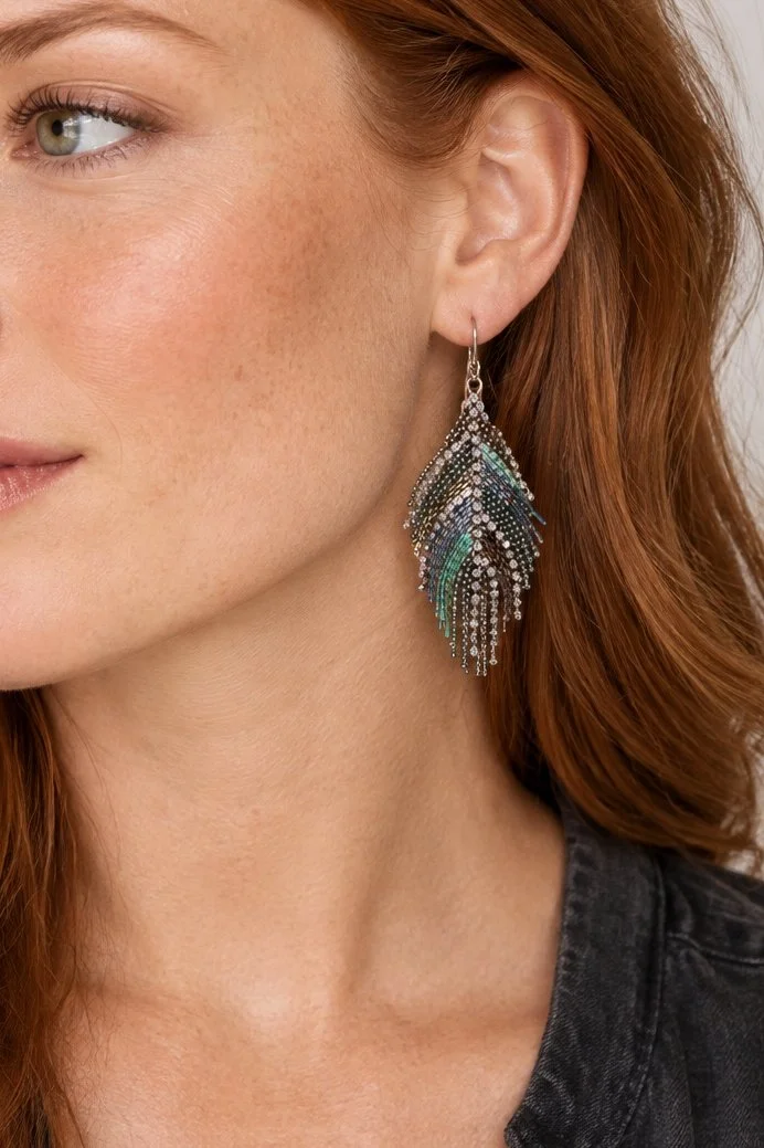 Freckled Redhead with Cascading Teal Earring.jpg