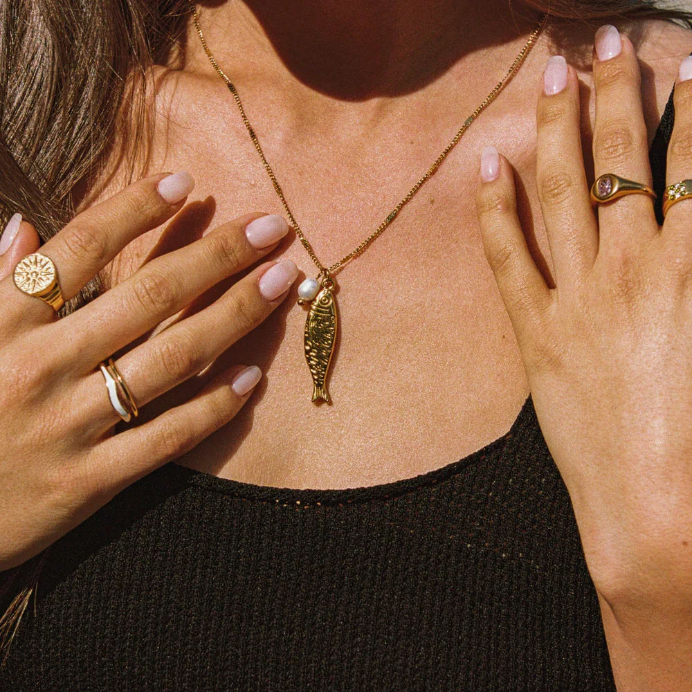 golden-fish-necklace.png.webp