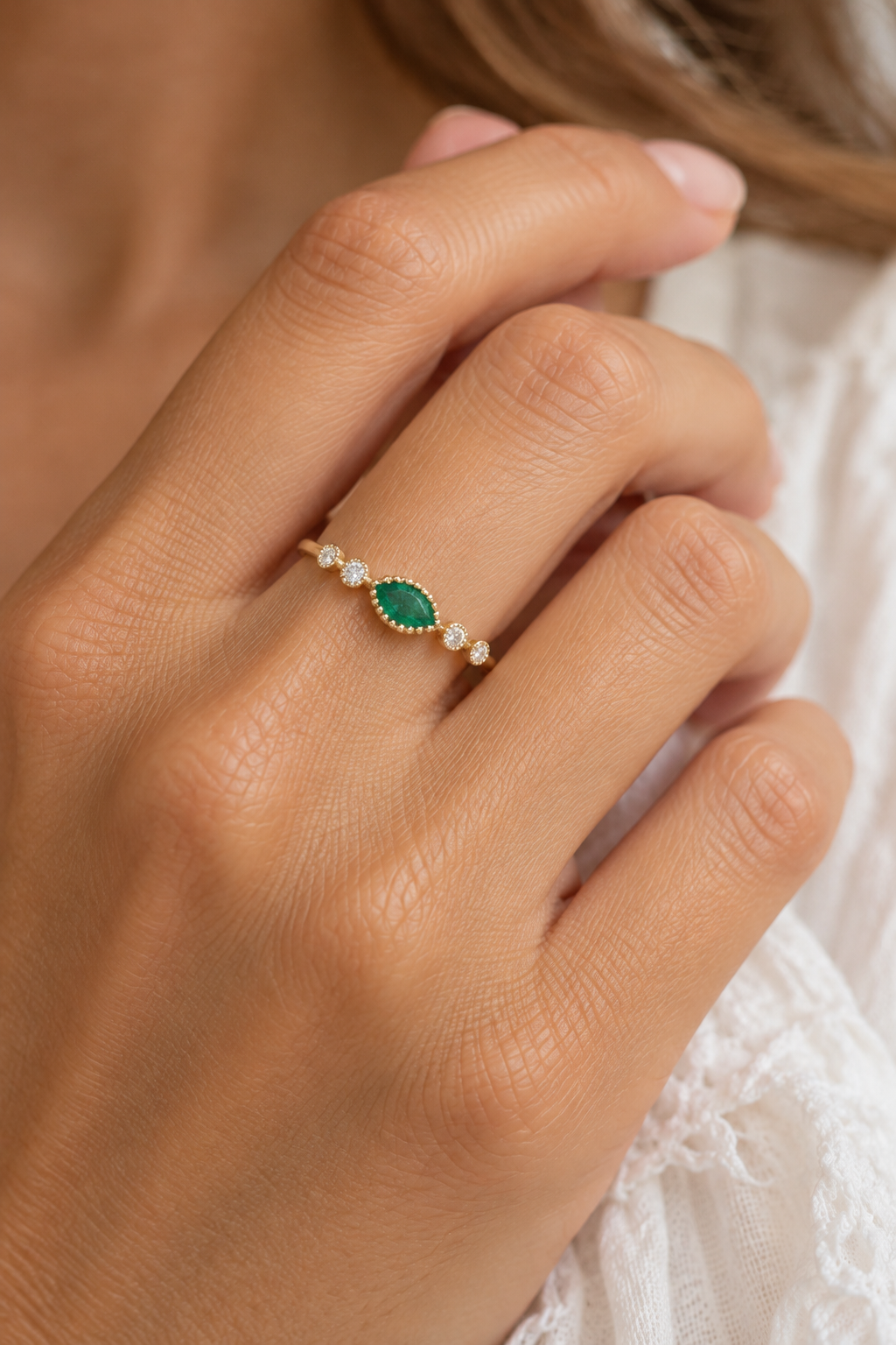 Emerald and Diamond Ring Close-Up.png