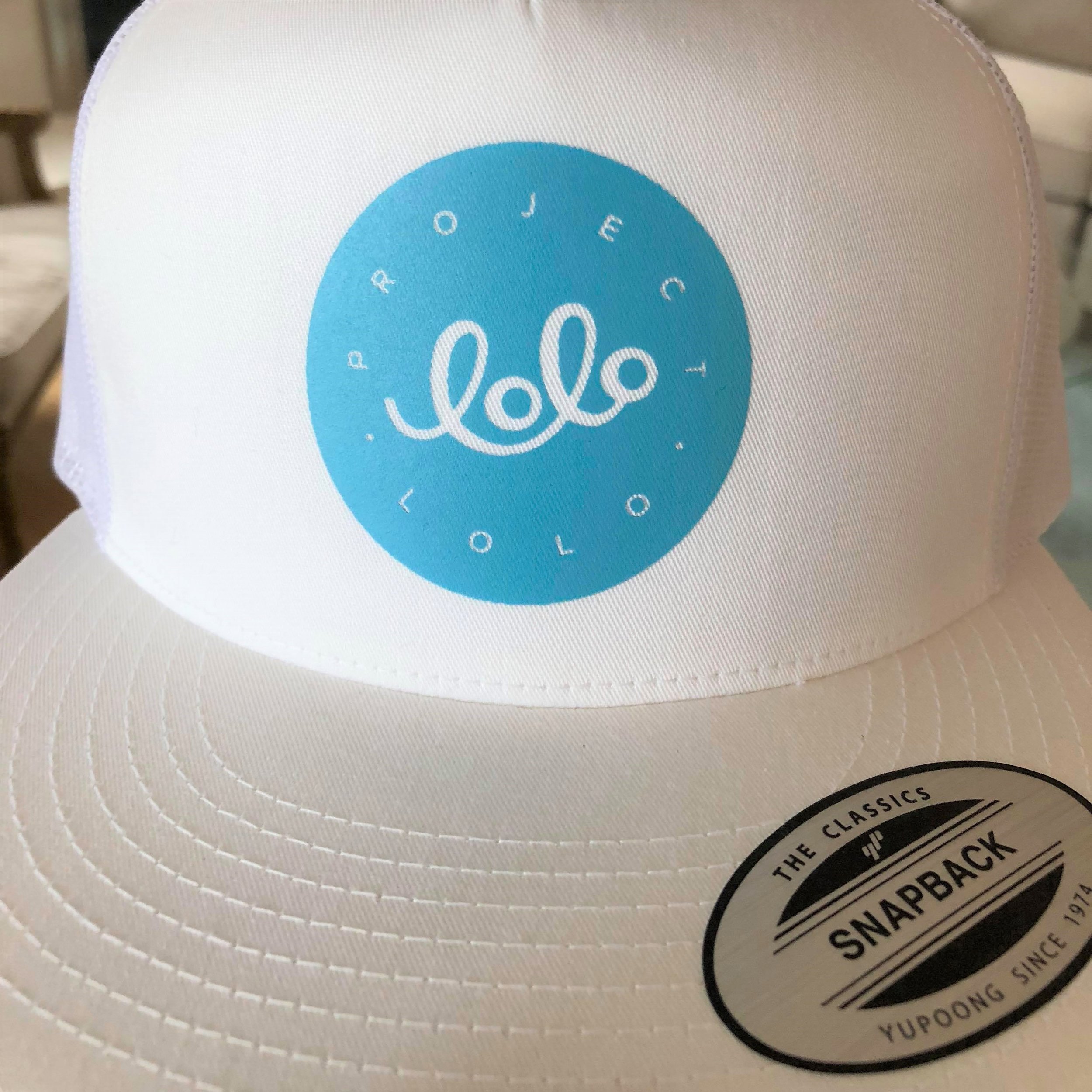 Project_Lolo_Hat_White_Blue_Circle_Logo_20180608.jpg