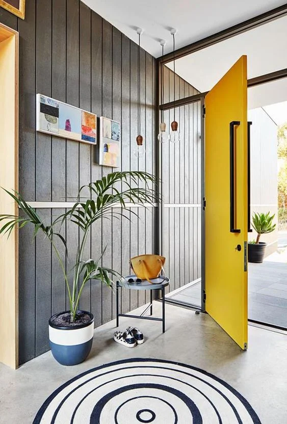 Source: www.homestolove.com.au Why NOT try a yellow door? It is fun, warm and inviting.