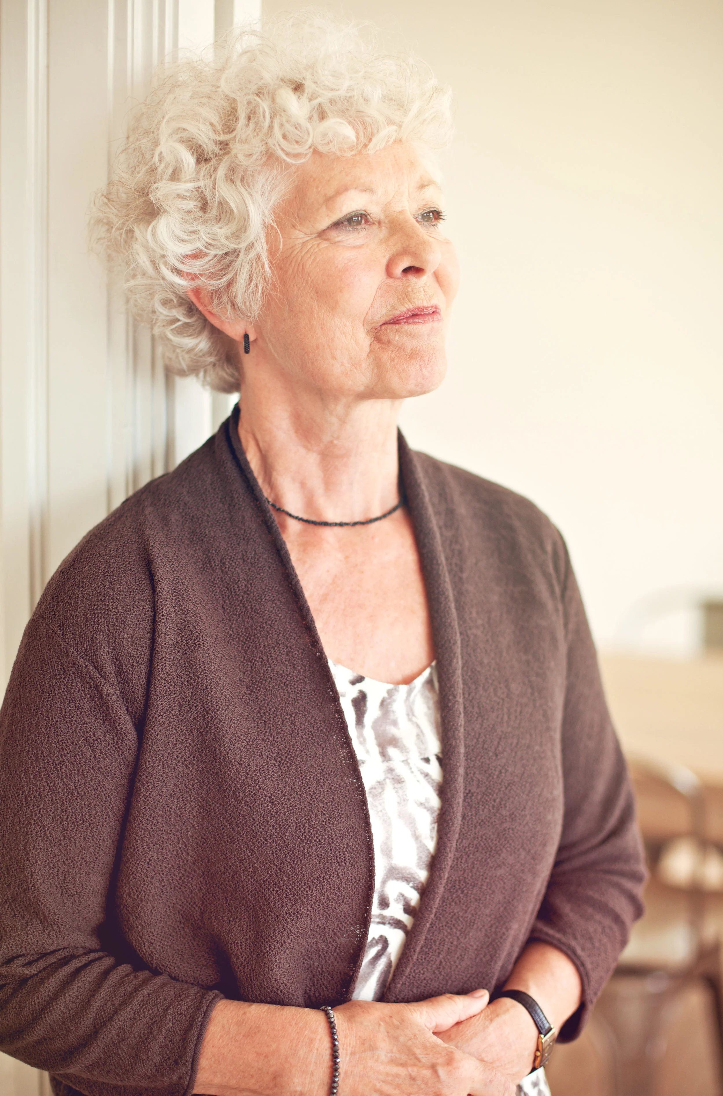 senior-woman-looking-away-and-thinking-about-something_BTfZtBB4Yl.jpg