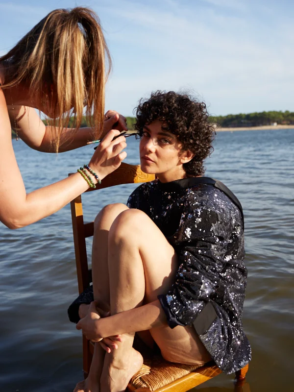 Marine Gaudin wears jacket EVANBENJAMIN , styled by Cyril Vinchon, makeup by Lara Schittter.