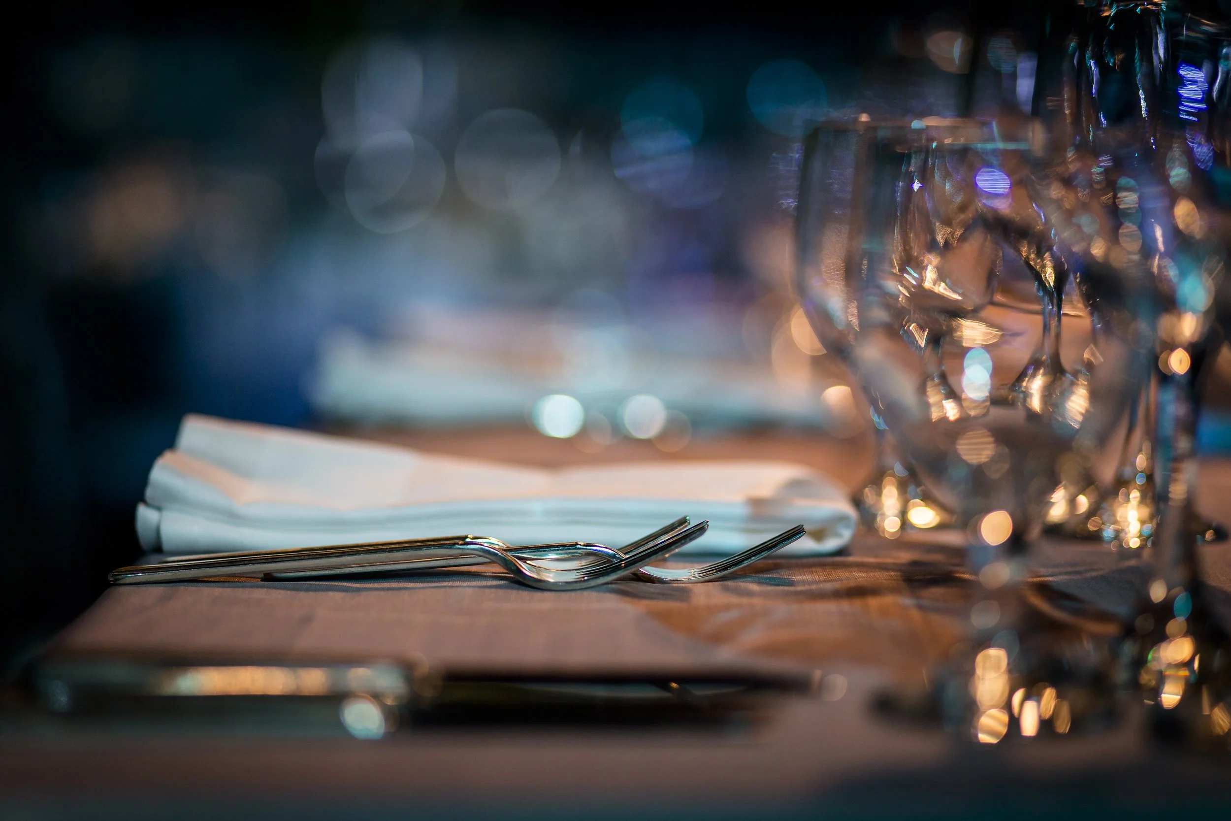 iStock-tabletop with glassware and silverware.jpg