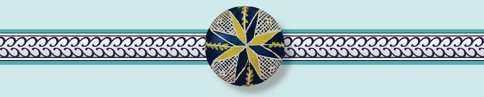 This top view of an Ukrainian Easter egg, traditionally known as a pysanka, features the star symbol representing Omnipresence.