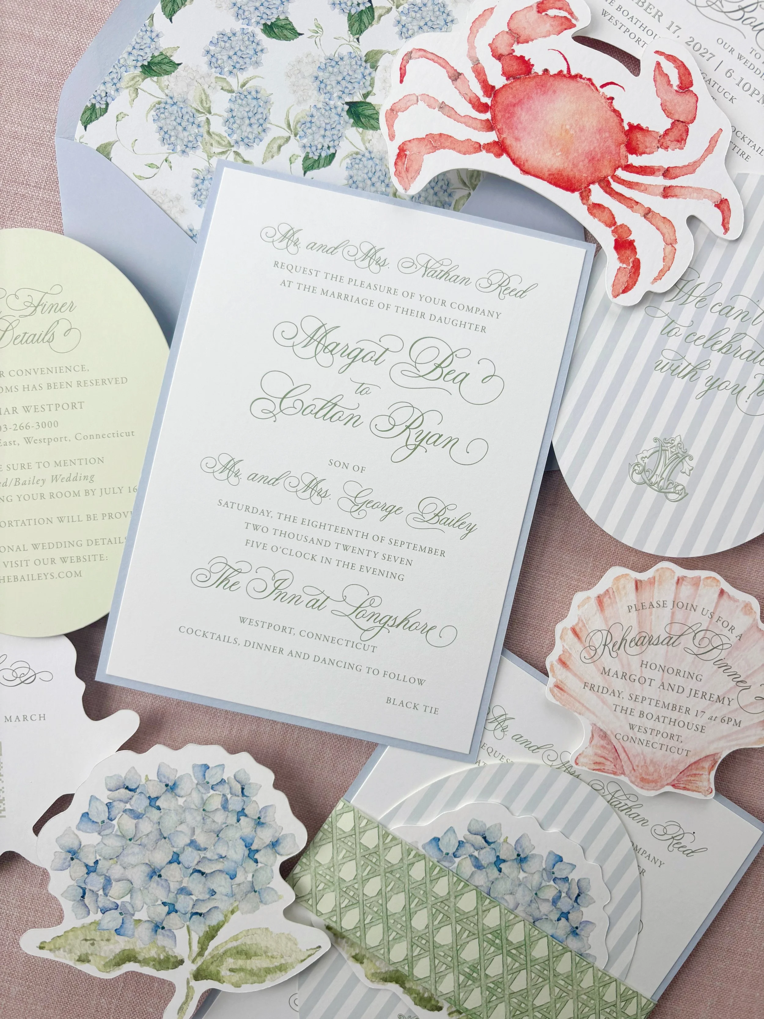 Blue and Green Coastal Watercolor Wedding Invitation Suite with blue hydrangeas, scallop shell rehearsal dinner card and crab die cut card