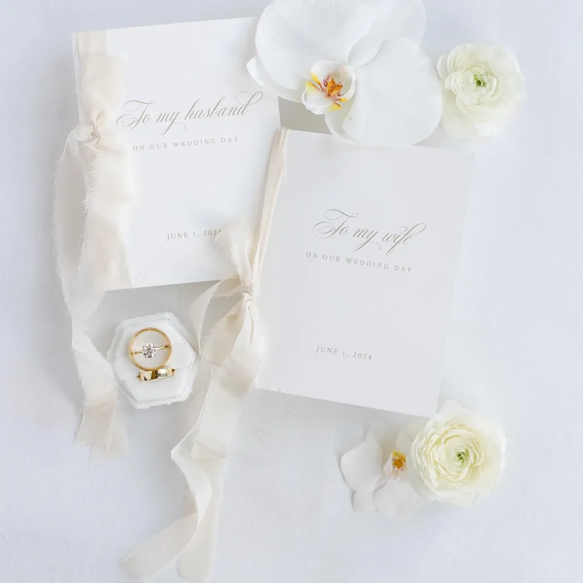 vow books with bone ribbon.webp