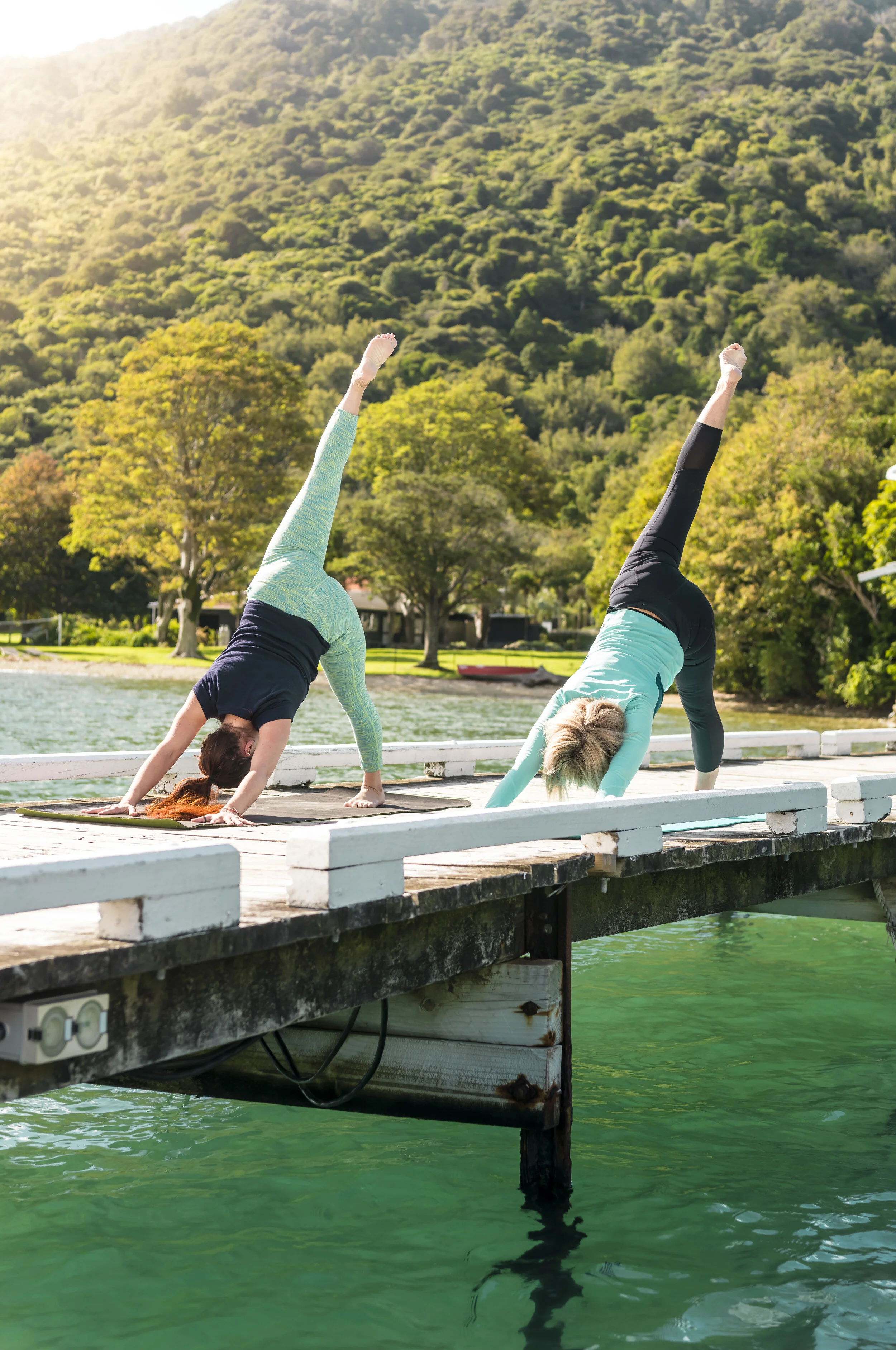 Furneaux Lodge yoga on jetty MH.jpg