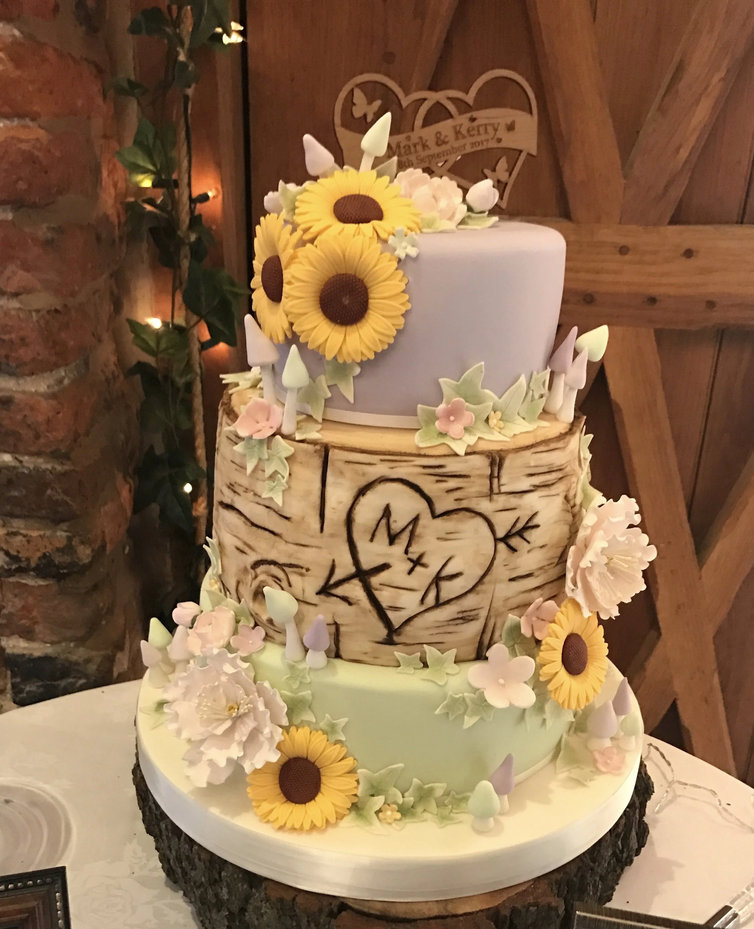 £450 Sunflowers and Log Enquire