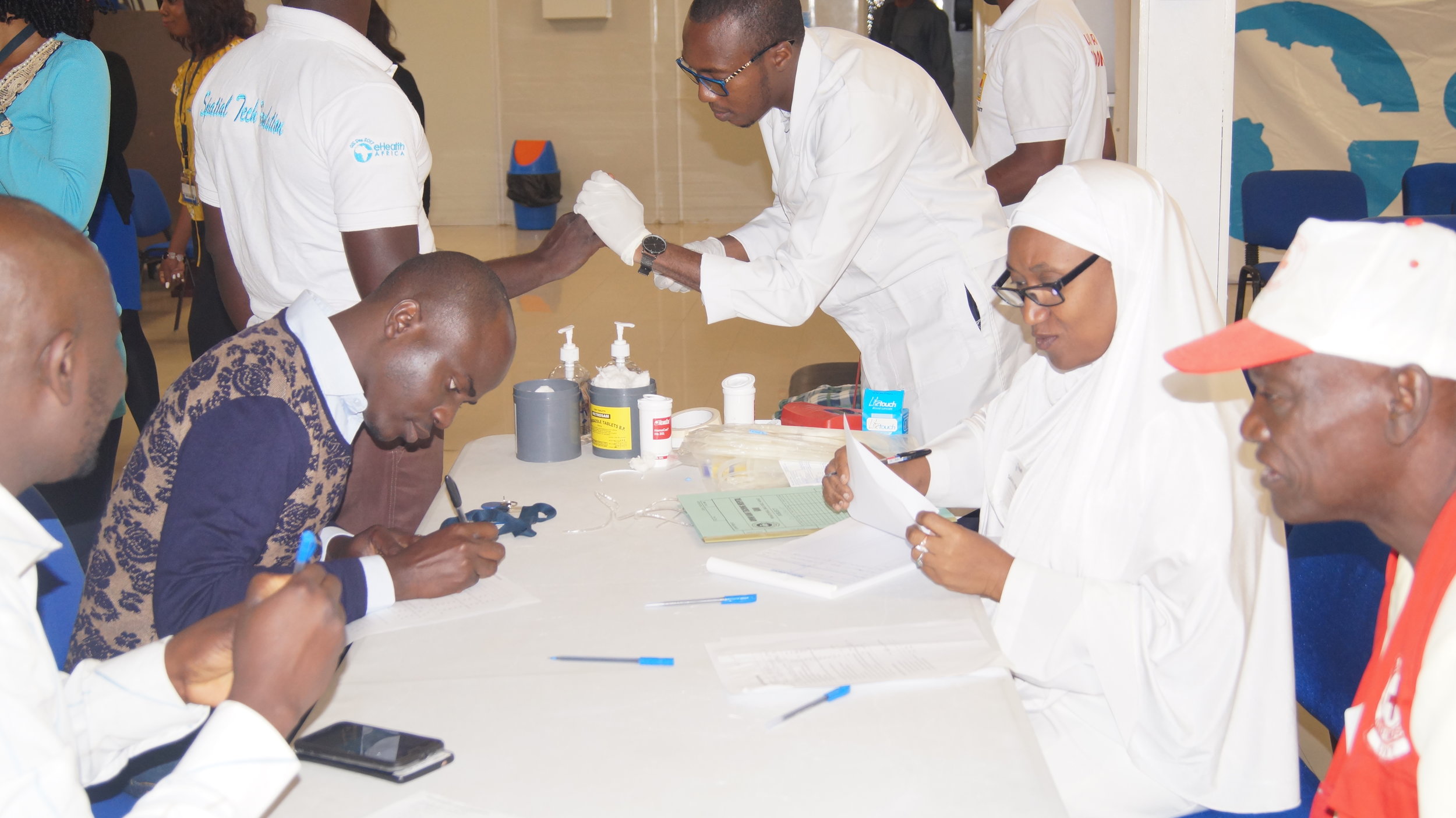  He completes an assessment form and supplies information about his medical history to help the Red Cross assess if he is eligible to donate blood.    