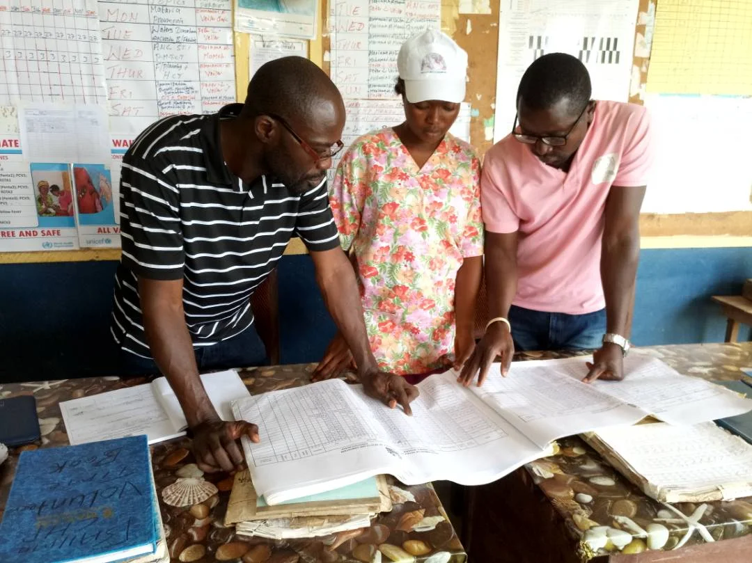 FETP National Mentor Amara Sheriff conducting supervised data quality audits with mentee.