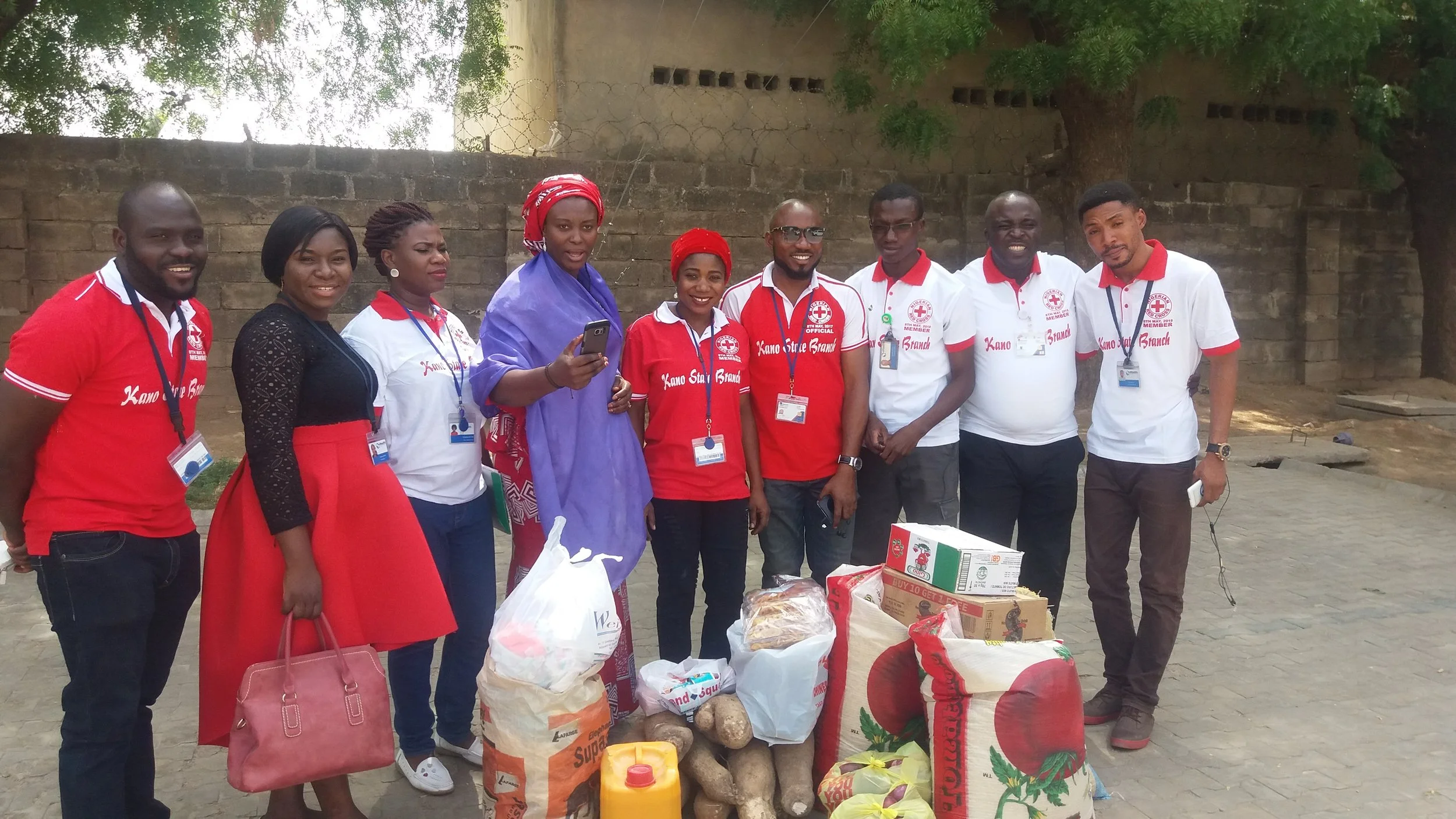 eHA Kano staff donating items.jpg
