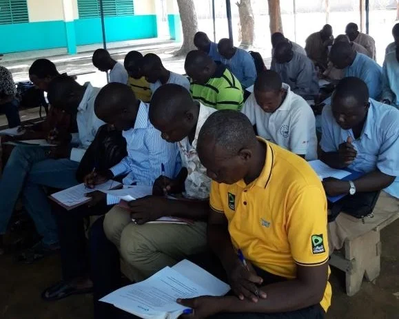 Chad 1st level supports going through pre-test during the transition training in Bokoro, Chad