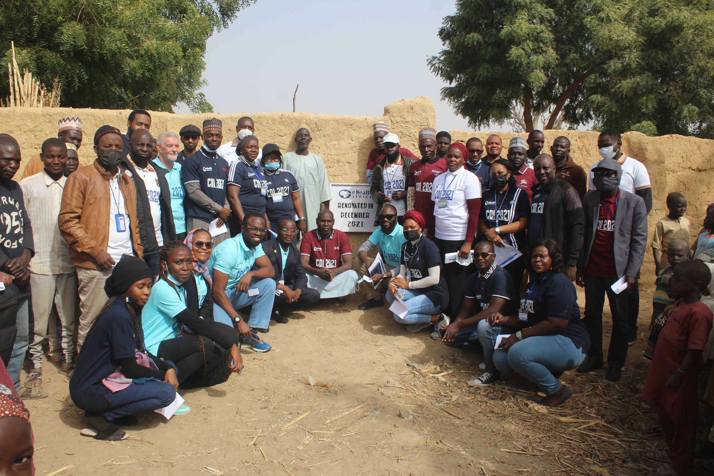   Group photo of the eHA and REACH team at Sharifawa community.  