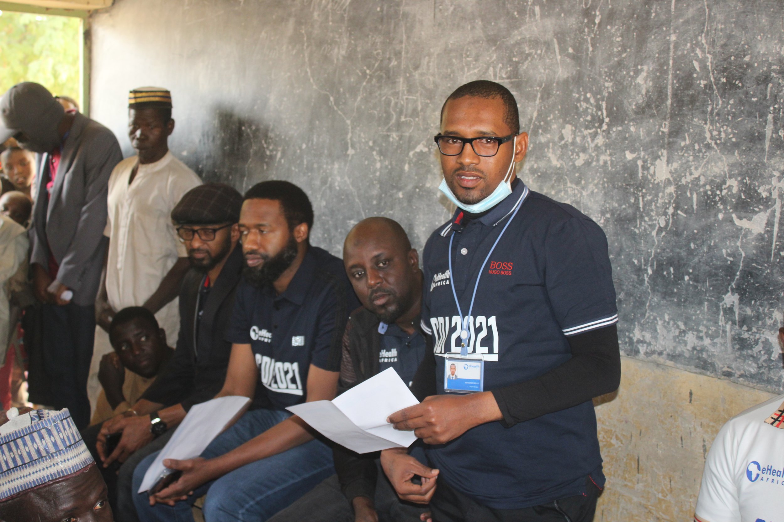   Mohammed Bello telling the community the reason for our visit.  