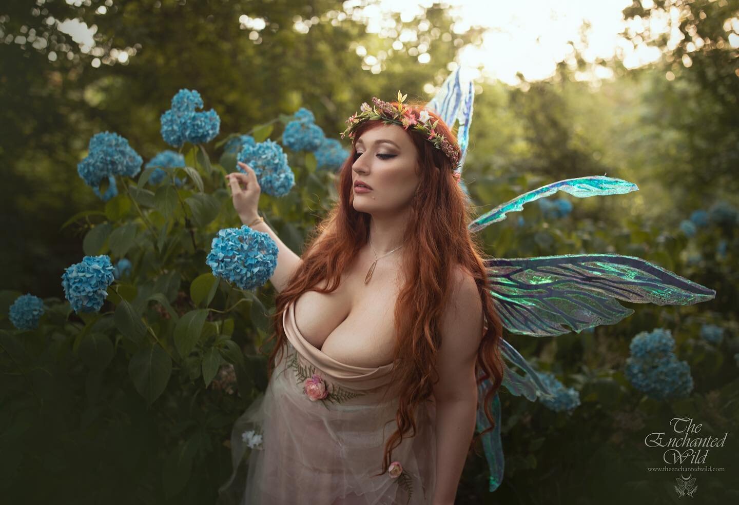 Surrounded by the beauty of flowers and darling friends during our fae picnic a few weeks ago.  Lingering a few extra moments to appreciate these hydrangeas in the dwindling light. 🧚&zwj;♀️🌿
My wings and floral crowns are available to use for photo