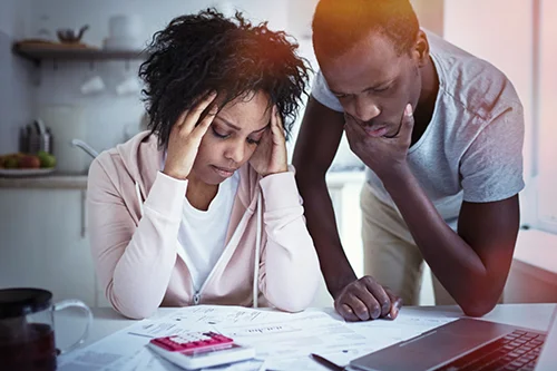 Recharacterizations - Young couple studying taxes RECTANGLE.jpeg