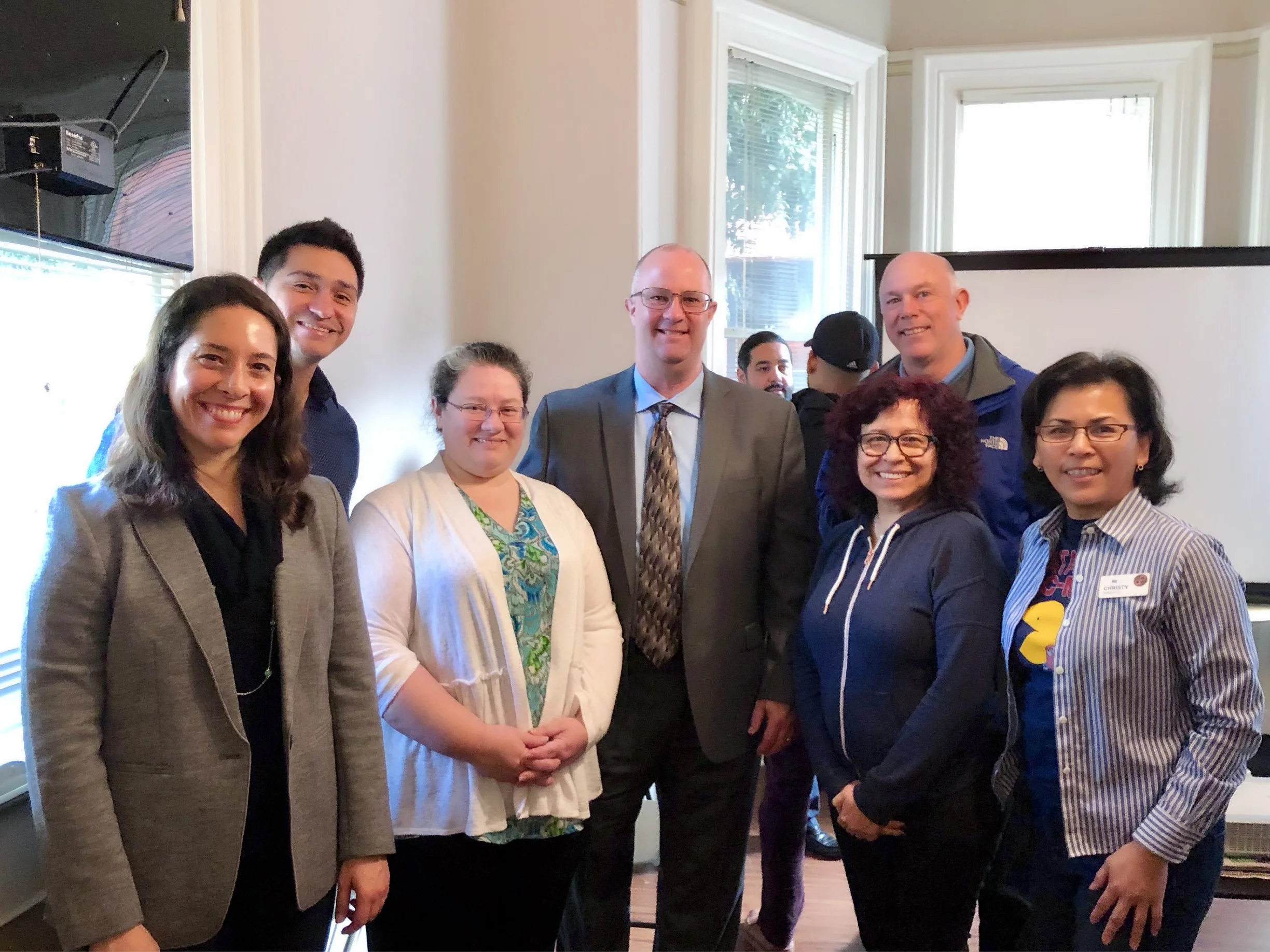 1 Million Cups: 2019 Fellow Jeff Neithercutt (in middle) surrounded by his SEA support crew (left to right), Yvette Goularte, Tony Braham, Becky Neithercutt, Dolores Sanchez, Buddy Hubbert and Christy Serrato