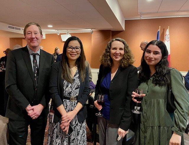 (L to R) Colin Sears and Sophorn Cheang from Business Oregon, Theresa Yoshioka of the Oregon Department of Agriculture, and a friend of OCC Scholar Lucien Lasocki