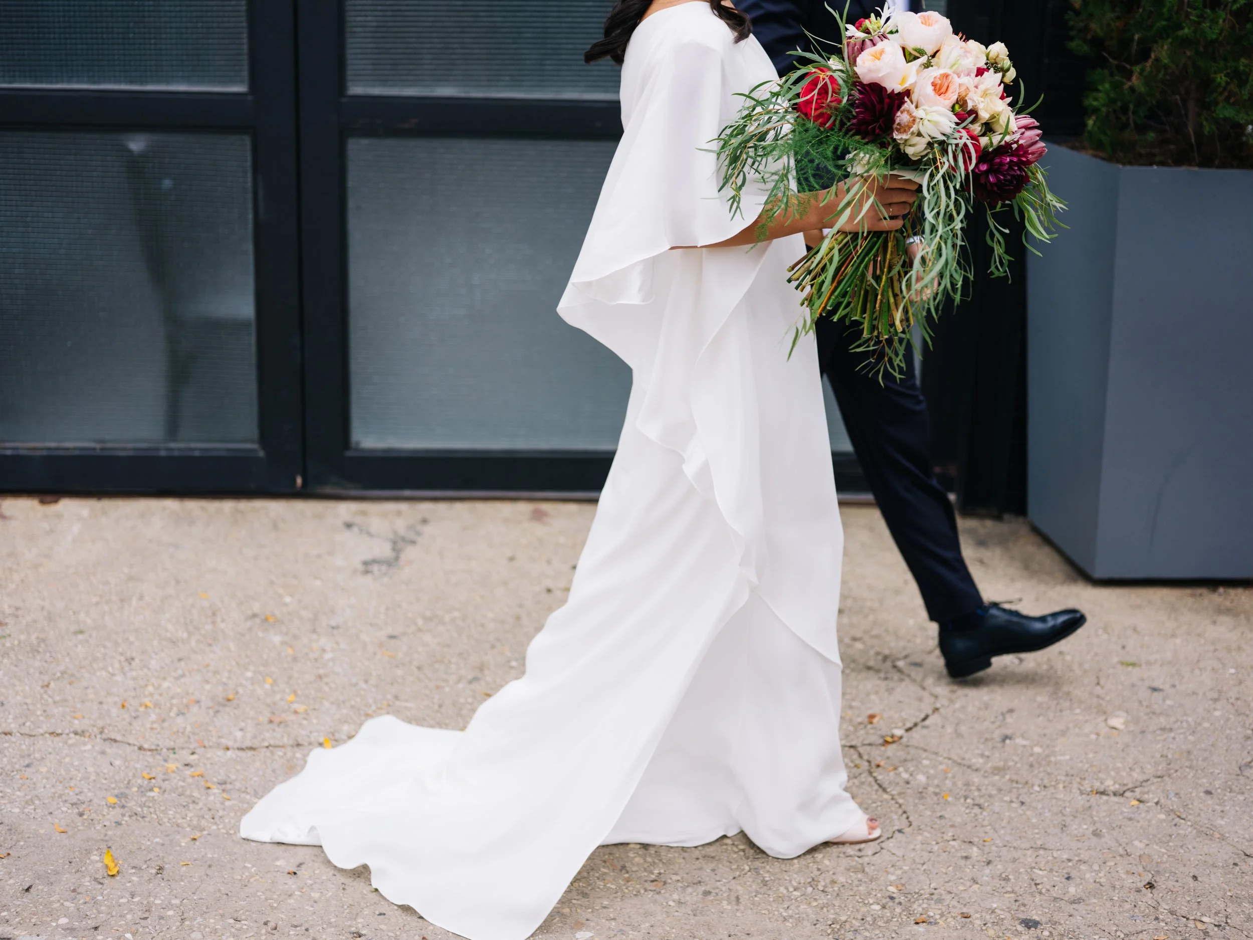 Katie & Jonathan have both lived in Brooklyn for over 10 years. It's where they met, fell in love, and built a home together. It was important to share their Brooklyn life with loved ones traveling from all over the world to celebrate their special day. Katie & Jonathan had attended enough weddings to know they didn't want anything stuffy or conventional. While they did maintain a few elements of tradition, the couple decided to skip the wedding party, walk down the aisle to Katie's favorite hip hop song, and write their own personal vows. They aimed to throw one big chic and beautiful, but relaxed, dinner & dance party. With all this in mind, the decor and atmosphere of 501 Union was the perfect setting to host 135 of their closest friends and family. 
