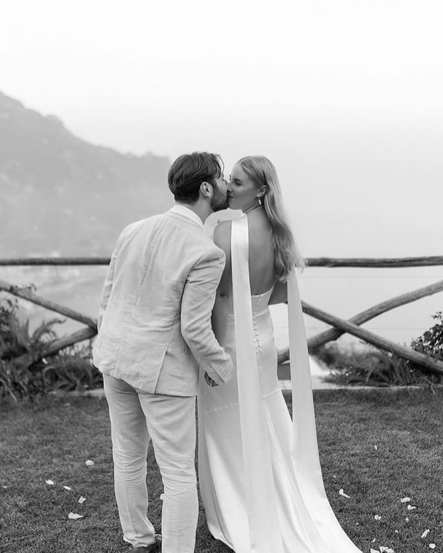 Romanticizing this day, forever 🕊️ #AGbride Hope wears our beloved #agSloan Gown paired with our Silk Scarf
⠀⠀⠀⠀⠀⠀⠀⠀⠀
photo: @paolomanzi 
video: @_harveyfilms
stockist: @amare_bride
planner: @youritalianweddingplanner
florals: @ravelloweddingflowers