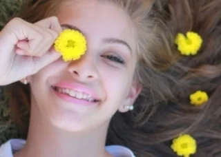 girl-with-flowers-in-hair.jpeg