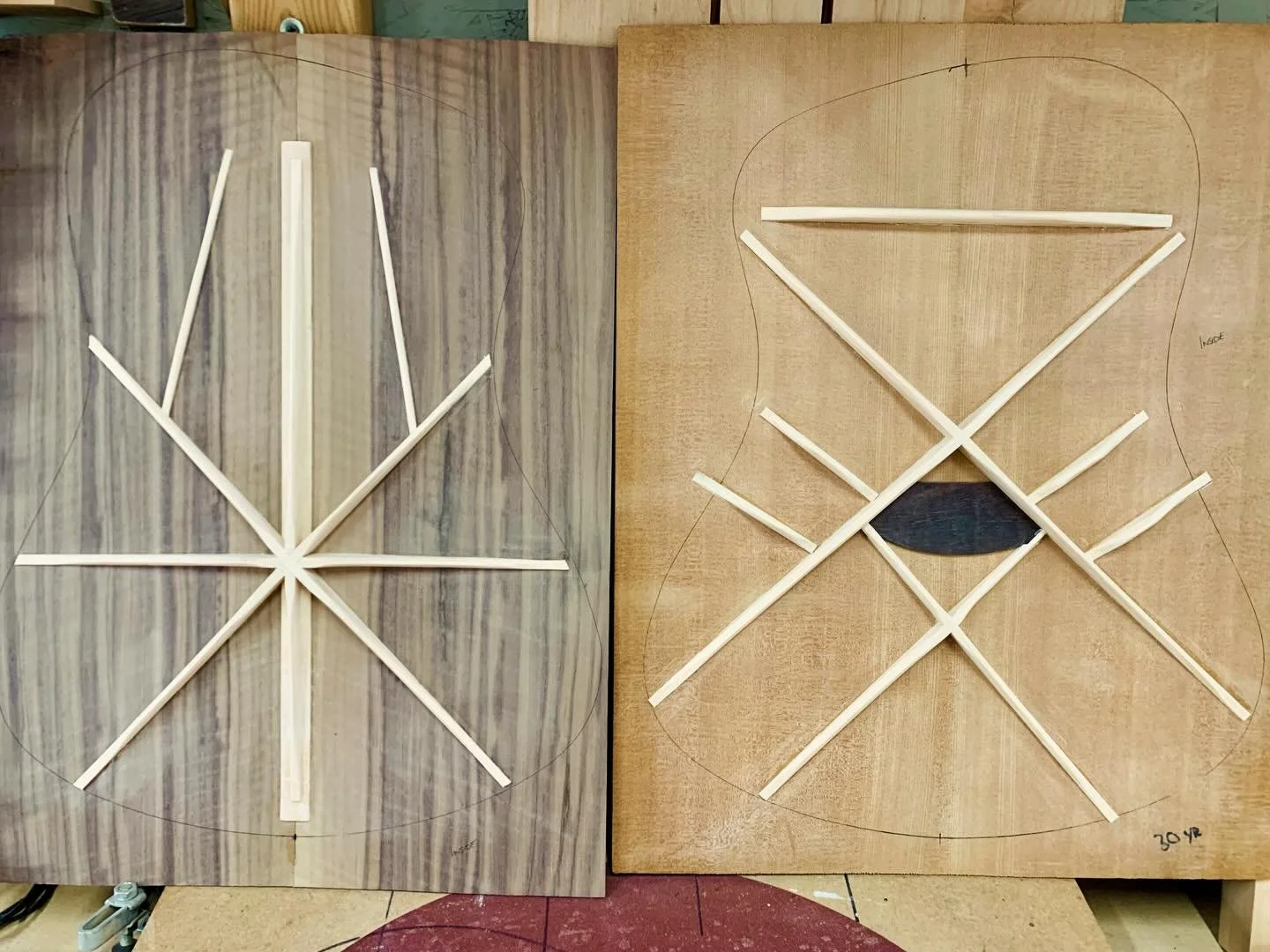 Here&rsquo;s a shot of the top and back for a new artisan series guitar. 30 year dried bear claw Sitka and fiddleback walnut featuring our windmill bracing. These have been tuned together in fifths for harmonic overtones. #artisan #acousticguitars #l