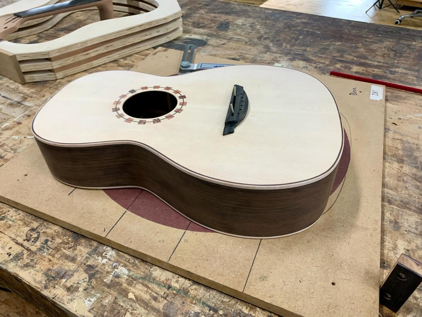 Here&rsquo;s a couple guitars on the work bench. A traveler parlor, and an artisan S1! Check us out at www.ceolaguitars.com #luthier #handmade #guitar #acoustic #artisan