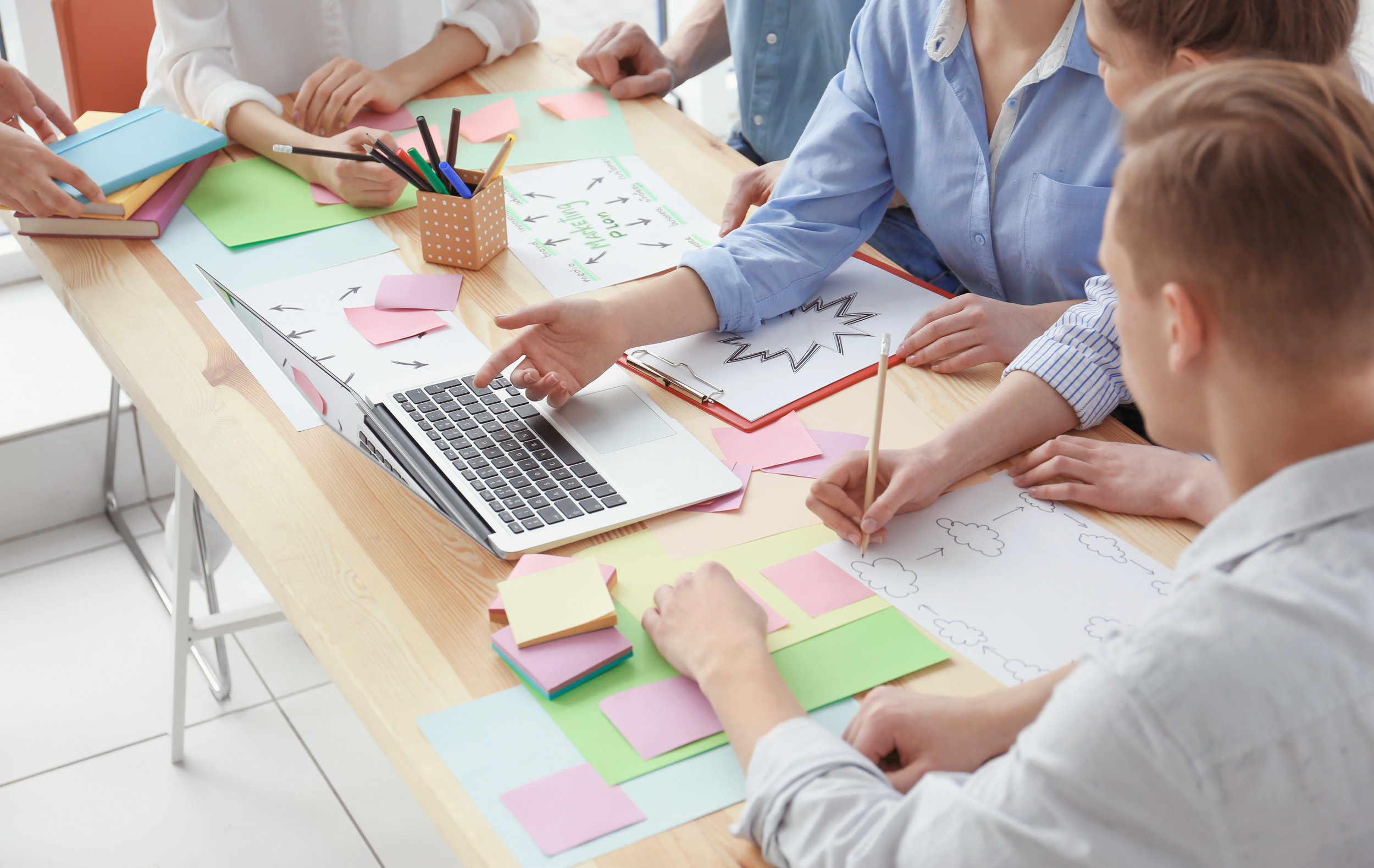 bigstock-Young-team-working-with-market-189083755.jpg