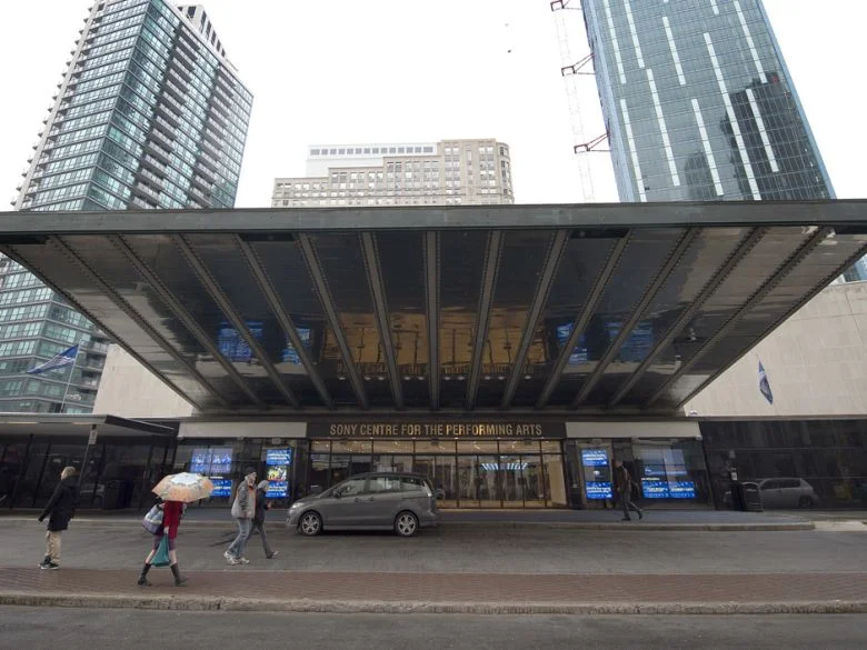 This is the main entrance of Sony Centre for the Performing Arts. It is located on the southeast corner of the intersection of Front Street and Yonge Street. A door attendant will greet you in the main lobby and direct you to the lower lobby. There are 26 steps or 1 elevator down to the lower lobby.