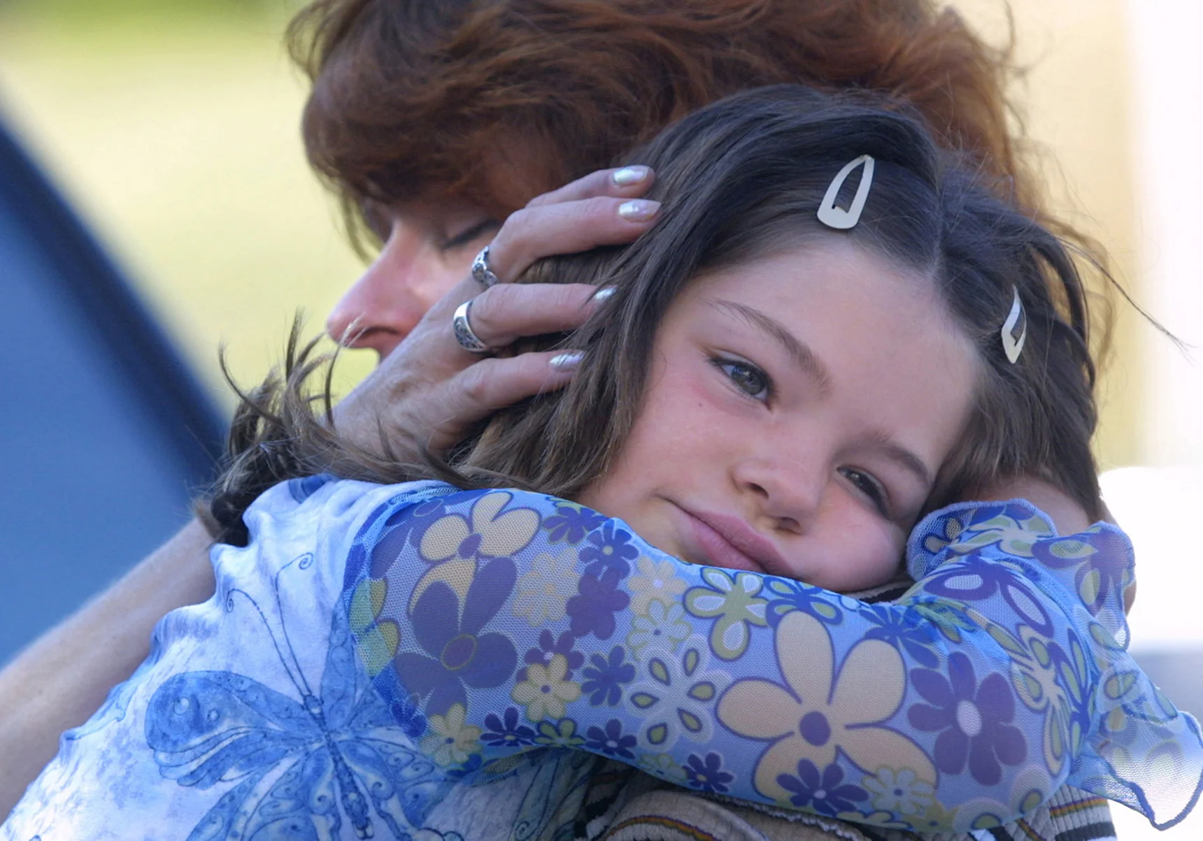 Muir hugs her daughter, Teylene, after checking out of the Kitsap Recovery Center. Her main incentive for going through the program was to get her children back.