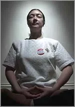 Imprisoned for her beliefs and forced to make toys for a multinational company ... Jennifer Zeng meditates in Sydney. Photo: Andrew Taylor