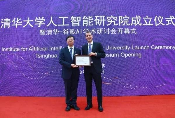 Xiu Yong (L), Principal of Tsinghua University presenting Jeff Dean(R) with a letter of appointment as a member of the Tsinghua University Computer Science Advisory Committee. (Credit: Official website of Tsinghua University) on June 28, 2018