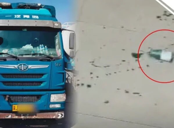 The truck of Jin Deqiang, and the bottle for the pesticide that had killed him.