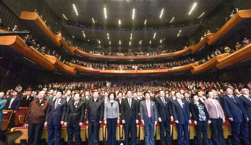 Everyone standing up when they play the CCP’s National Anthem