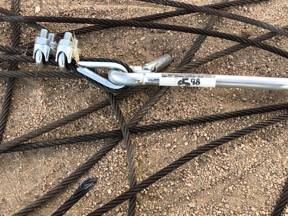 On July 17, steel cables left on the ground of the site after a failed attempt to pull down the status by a truck. Source:   Guppy Dong’s Facebook page