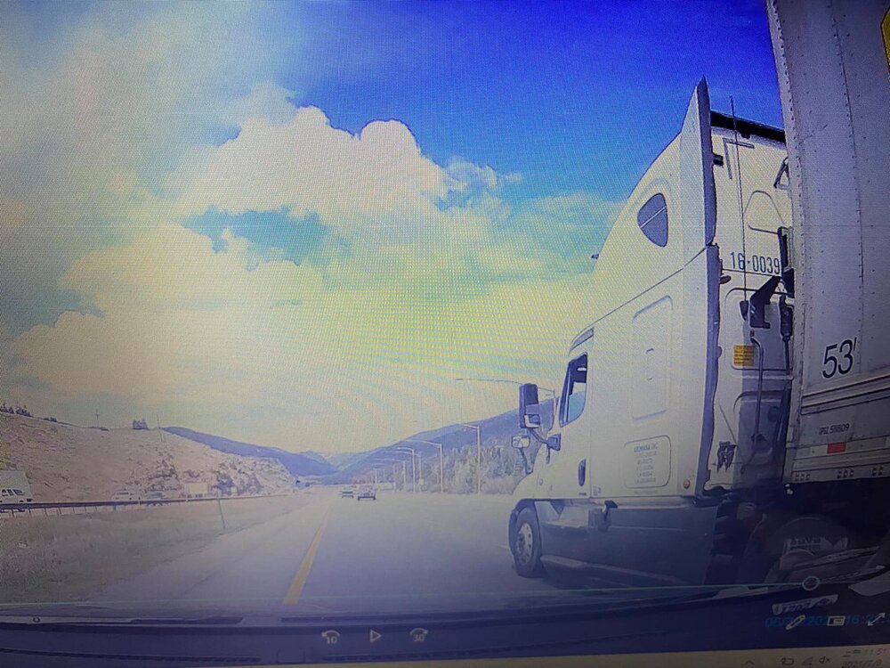 On June 30, car camera footage shows a UPS truck suddenly cut into Guppy Dong’s lane.  Source:   Guppy Dong’s Facebook page