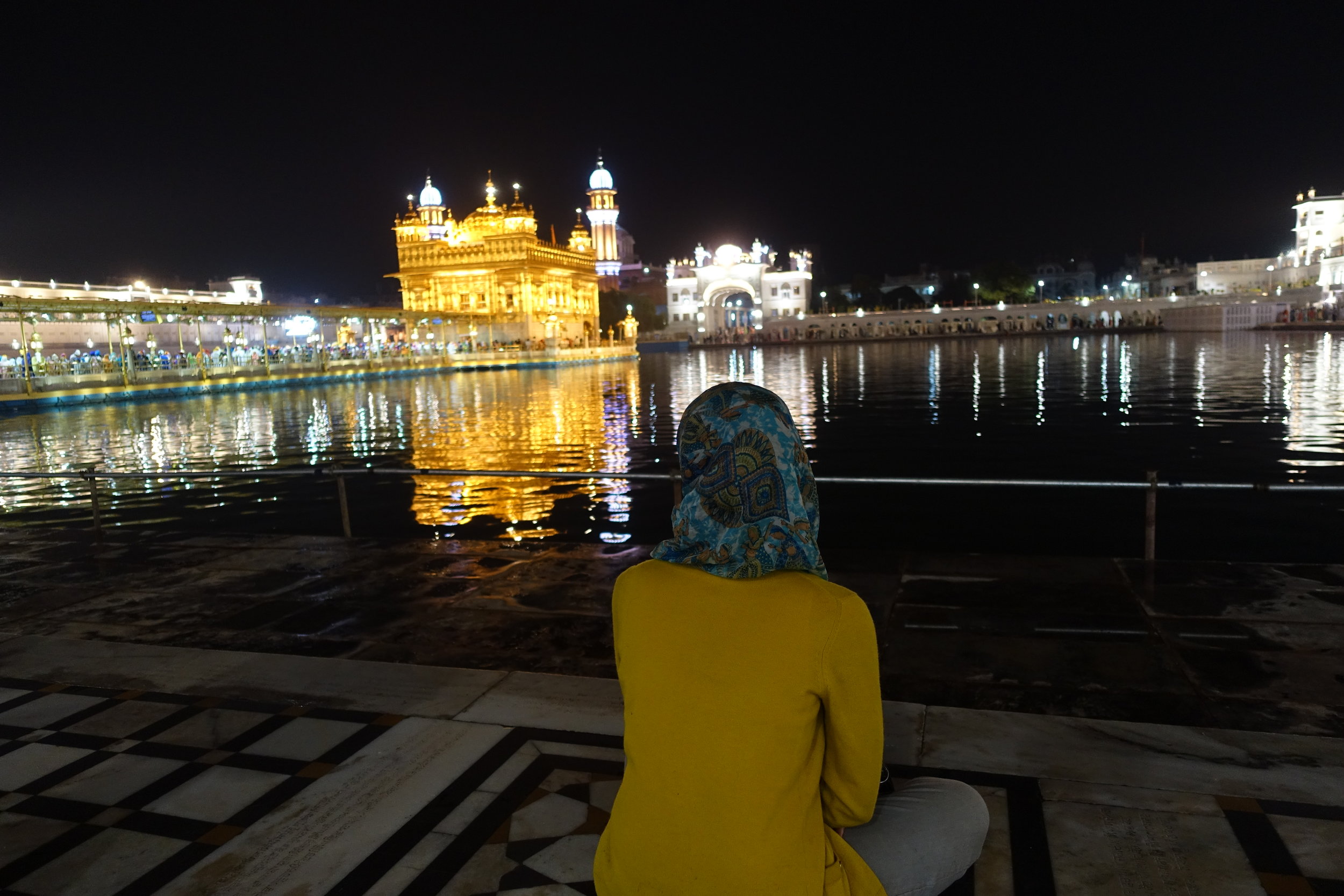  We visited the Golden Temple around 4 am one day, and this time we went inside. The lines were shorter because the holy book (Guru Granth Sahib) enters the temple a little later.  