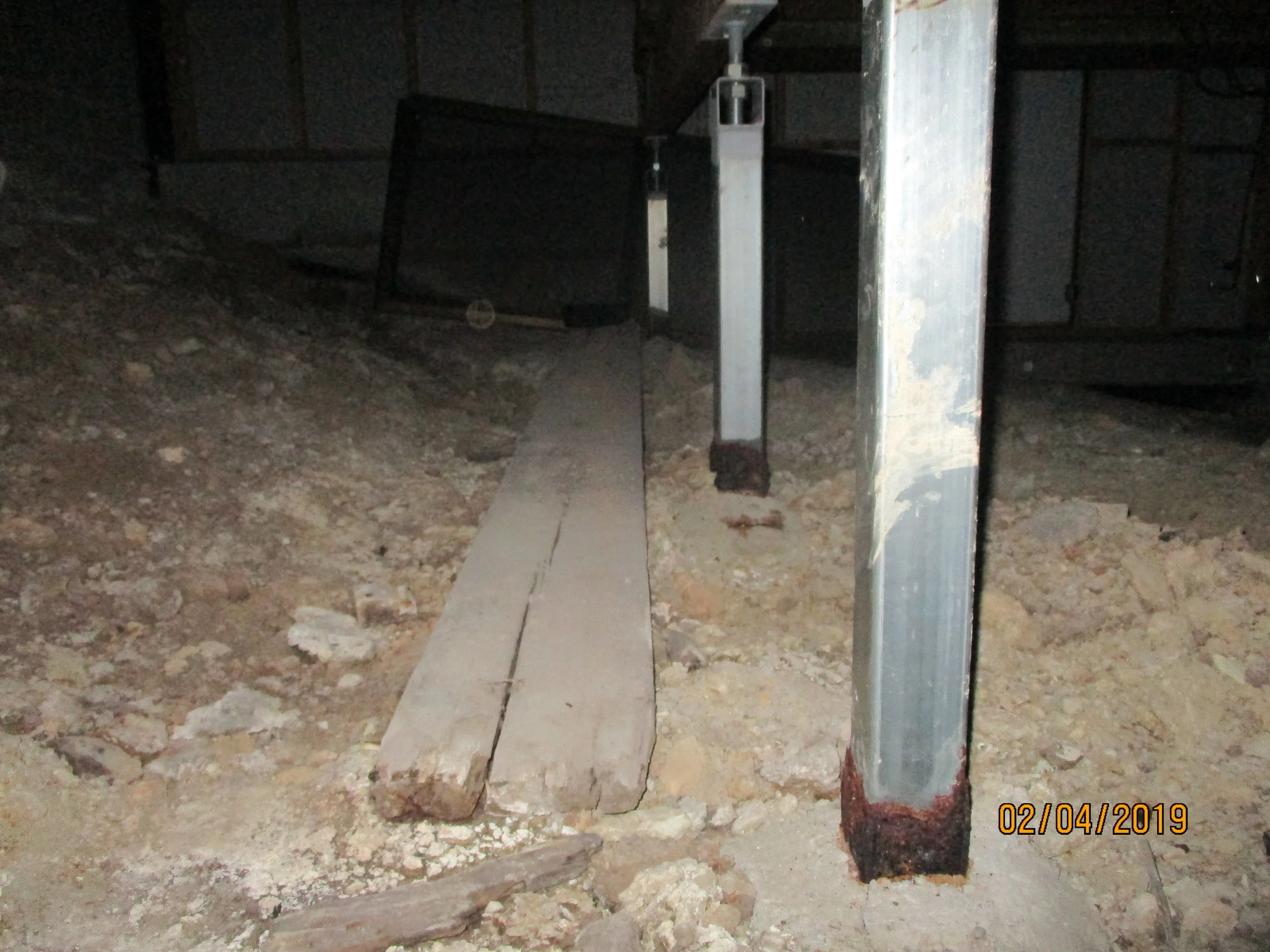 Subfloor - rust/corrosion to steal foundation piers.