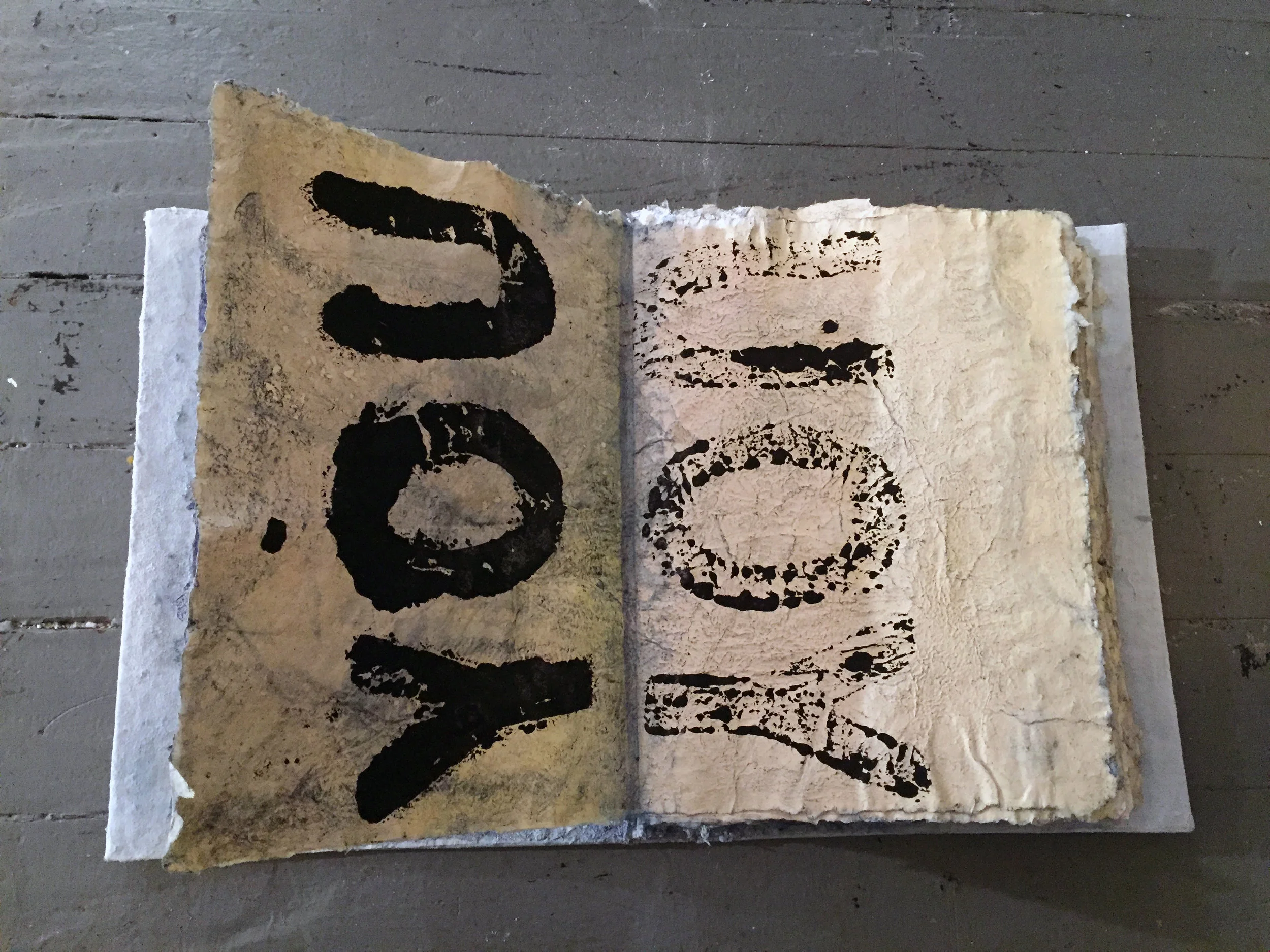 Echolocation (open), 2016, handmade paper, indigo, salt, and squid ink artist book