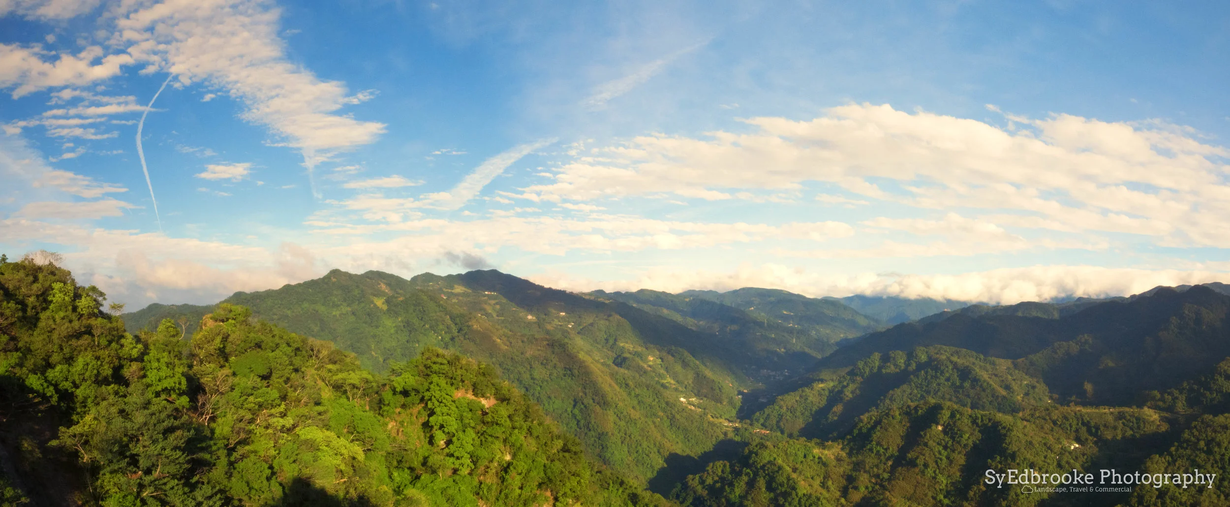 a panoramic shot of the valley stretching into the distance mountains. f22, ISO 640, 1/60, 24mm